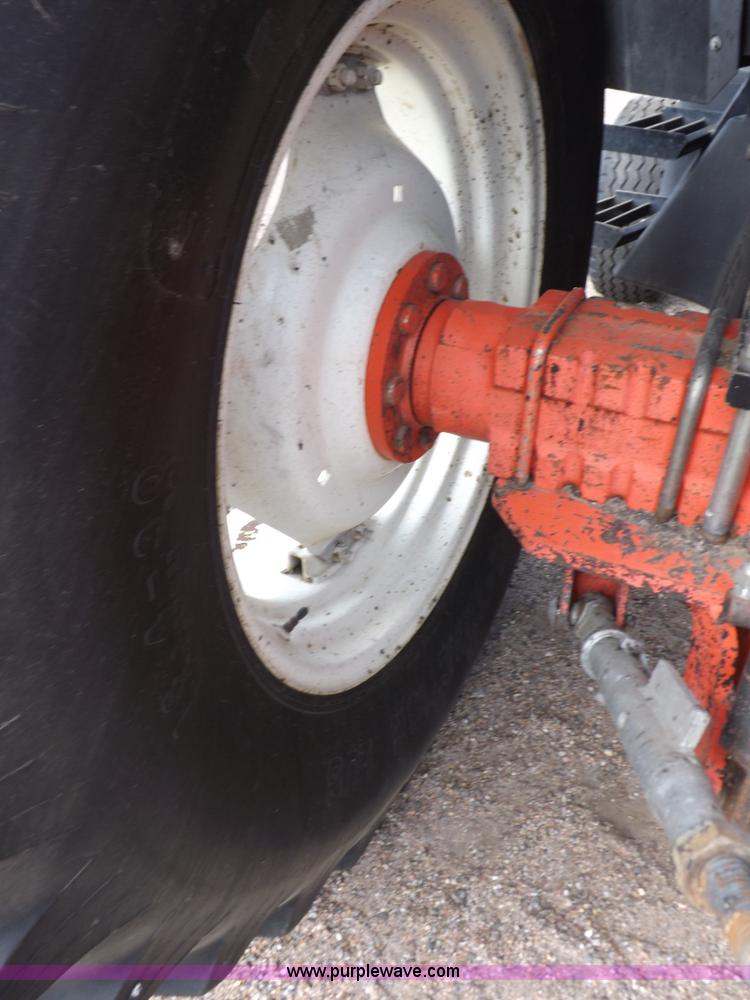 image for item H9110 2000 New Holland TS100 tractor