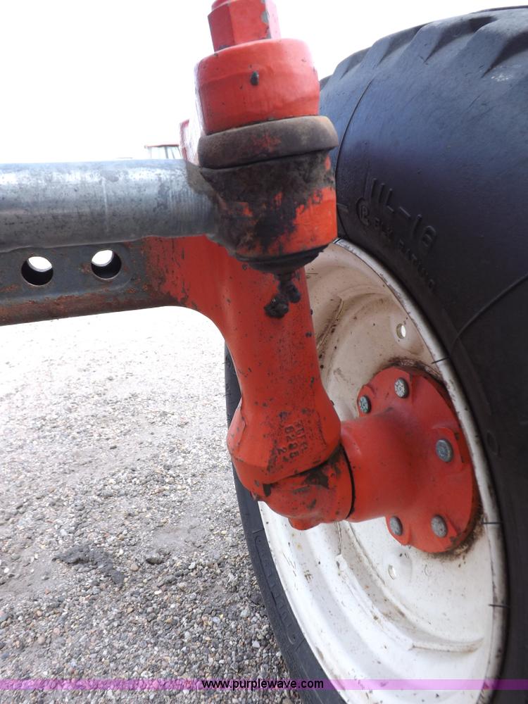 image for item H9110 2000 New Holland TS100 tractor