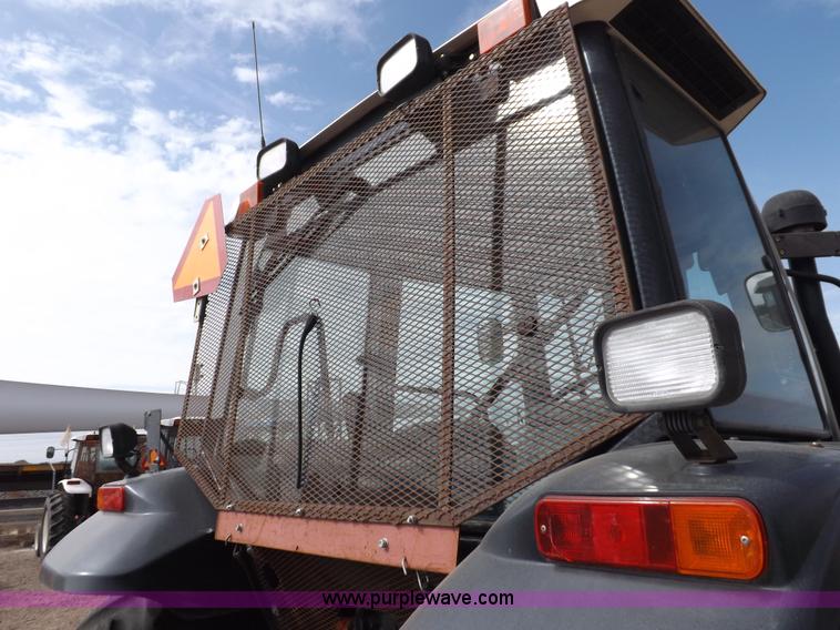 image for item H9110 2000 New Holland TS100 tractor