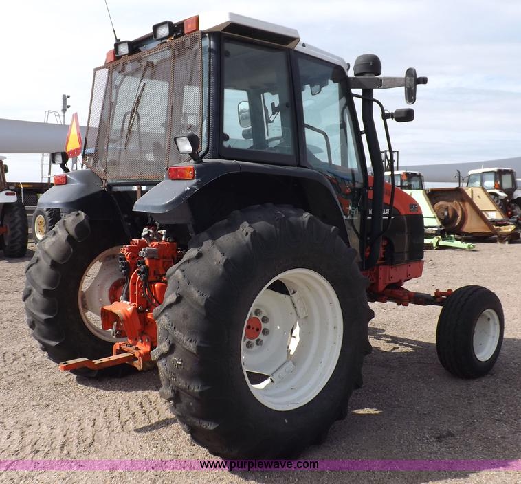 image for item H9111 1999 New Holland TS100 tractor