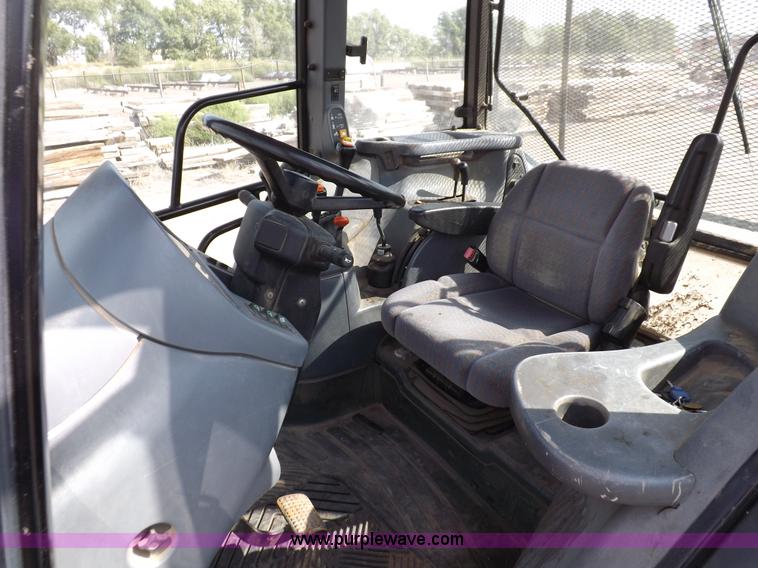 image for item H9111 1999 New Holland TS100 tractor