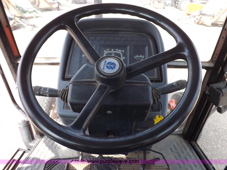 image for item H9111 1999 New Holland TS100 tractor