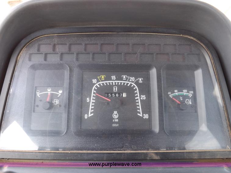 image for item H9111 1999 New Holland TS100 tractor