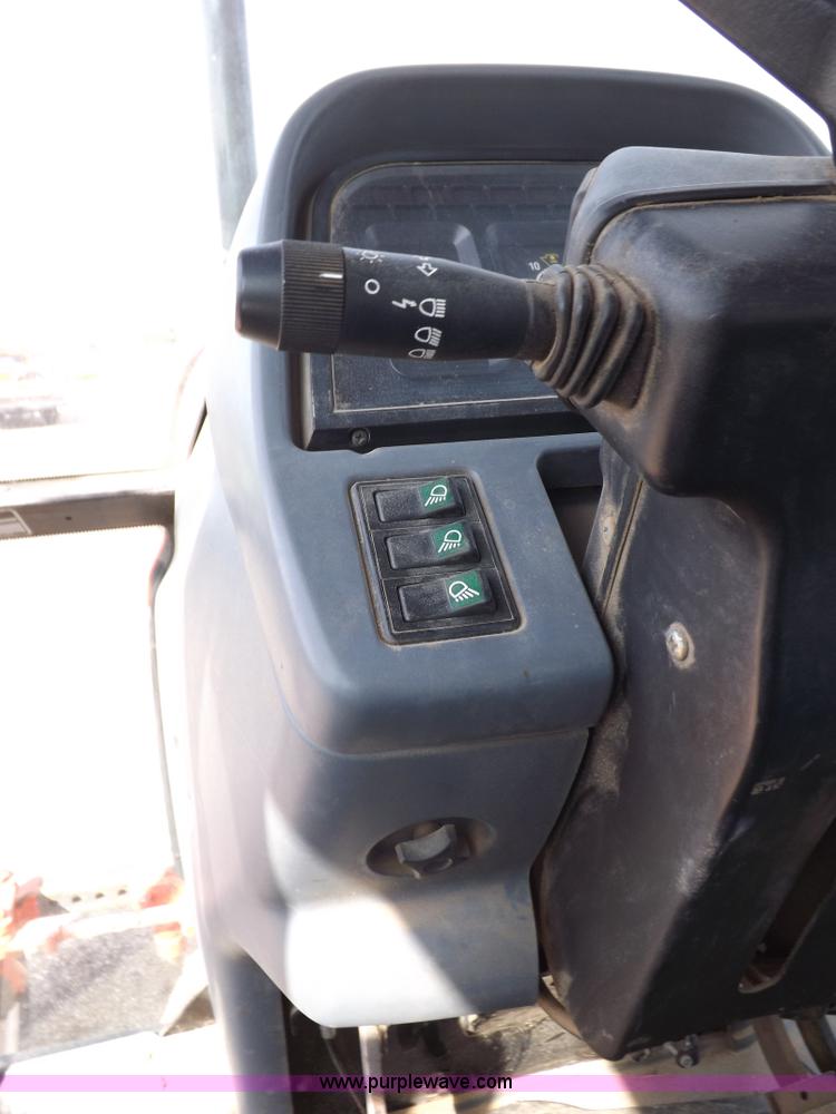 image for item H9111 1999 New Holland TS100 tractor