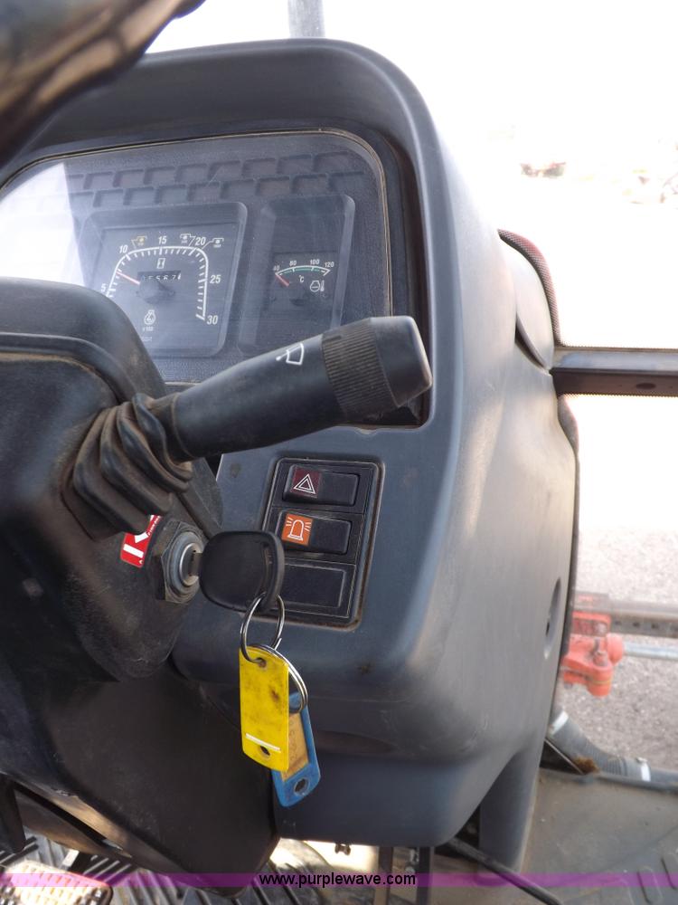 image for item H9111 1999 New Holland TS100 tractor