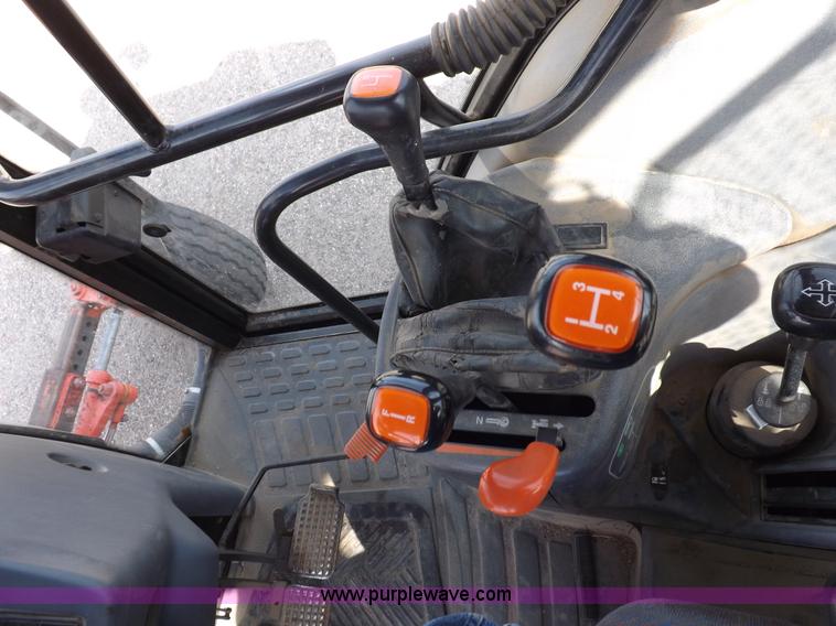 image for item H9111 1999 New Holland TS100 tractor