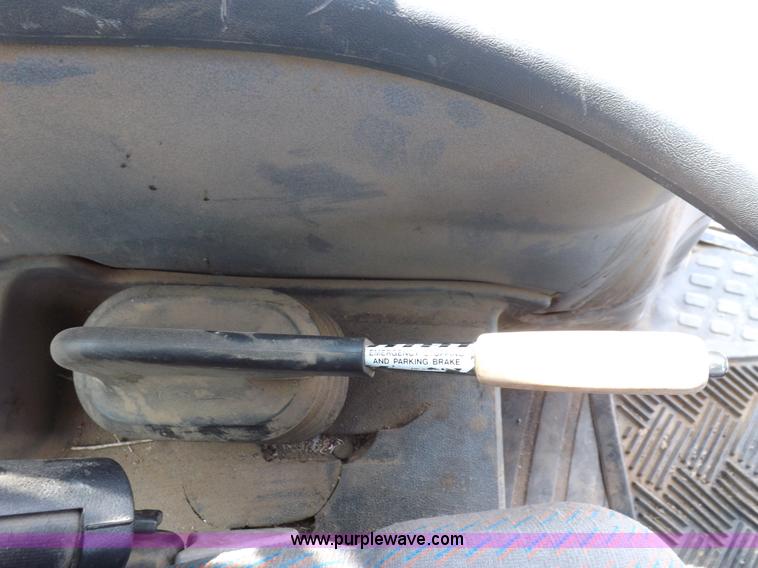 image for item H9111 1999 New Holland TS100 tractor