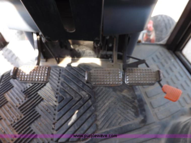 image for item H9111 1999 New Holland TS100 tractor