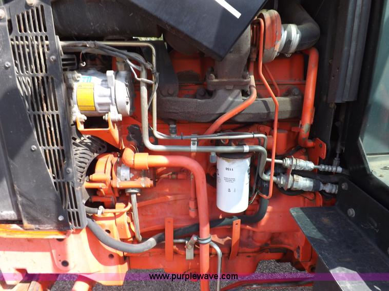 image for item H9111 1999 New Holland TS100 tractor