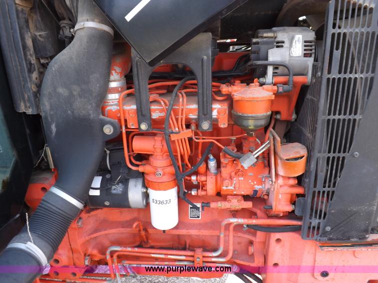 image for item H9111 1999 New Holland TS100 tractor