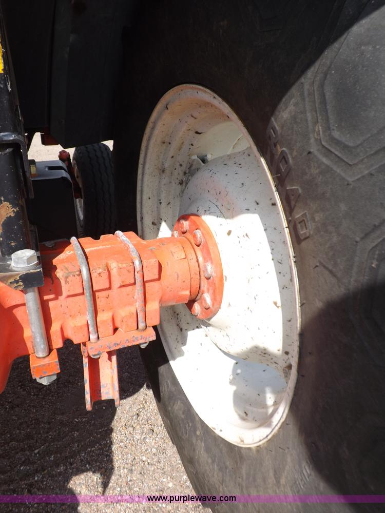 image for item H9111 1999 New Holland TS100 tractor