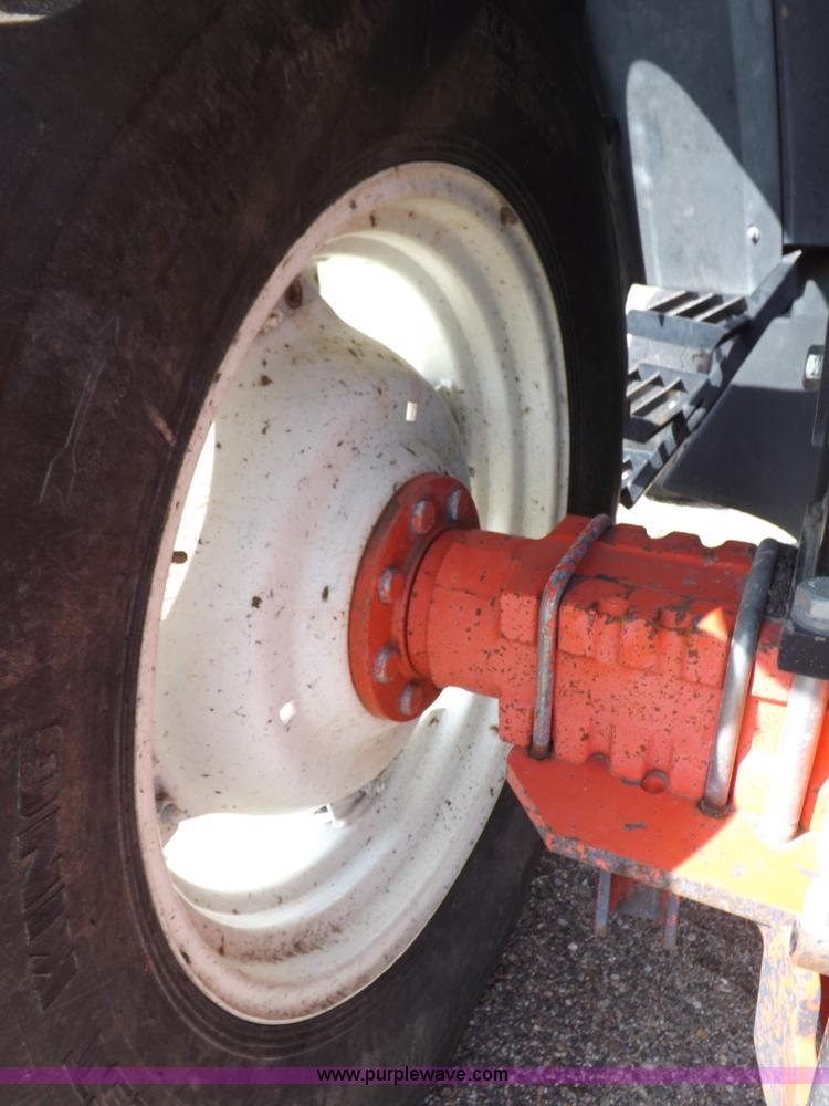 image for item H9111 1999 New Holland TS100 tractor