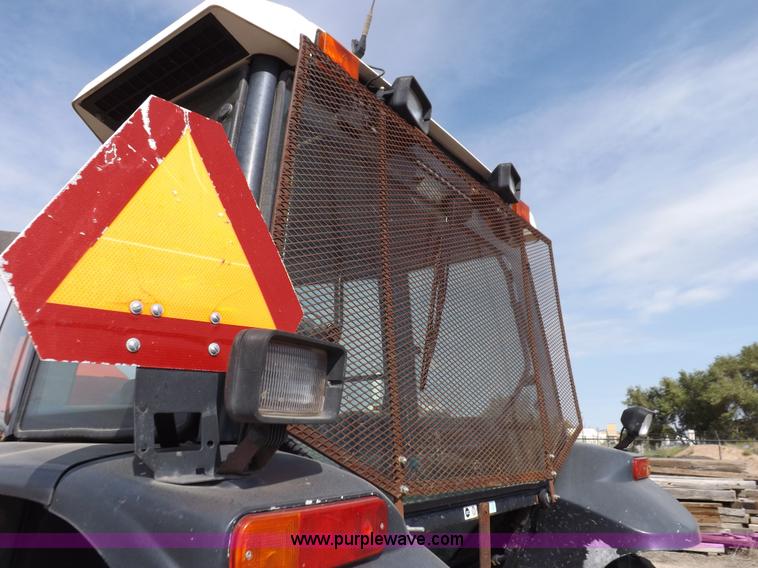 image for item H9111 1999 New Holland TS100 tractor