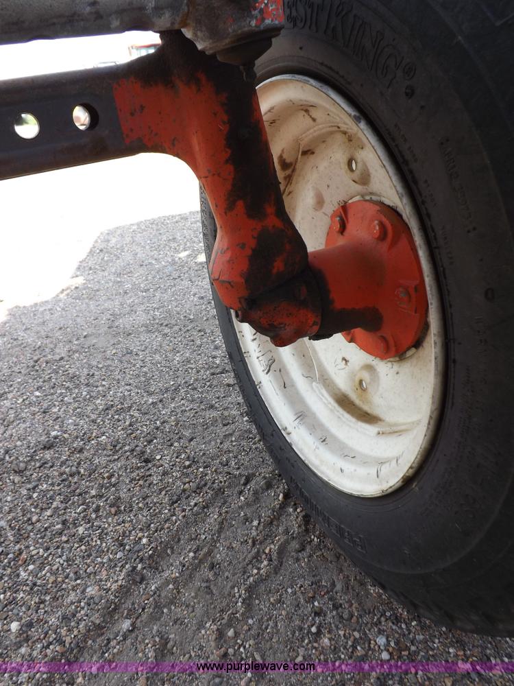 image for item H9111 1999 New Holland TS100 tractor