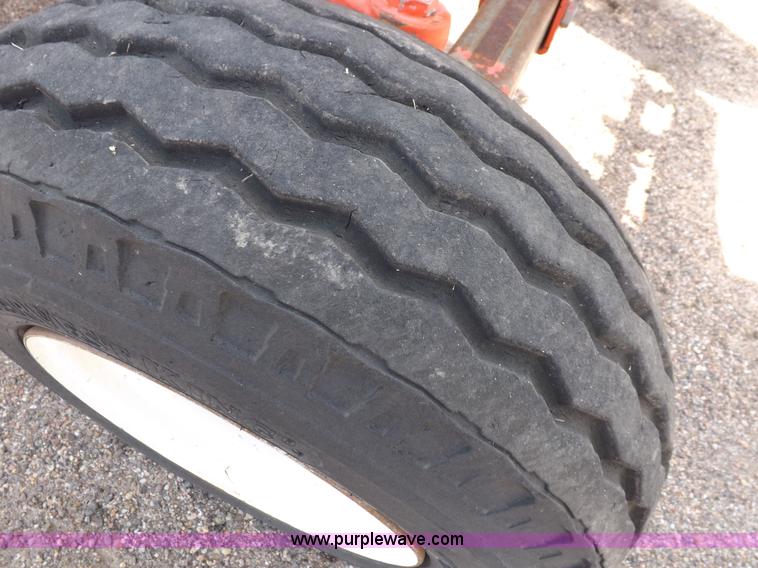 image for item H9111 1999 New Holland TS100 tractor