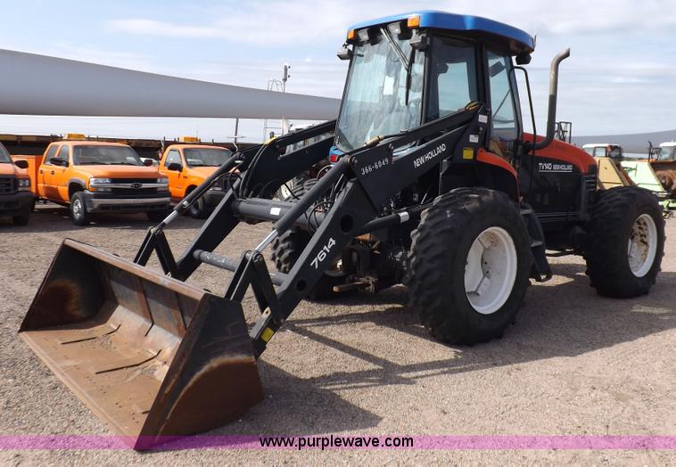 image for item H9112 1999 New Holland TV140 bi-directional MFWD tractor