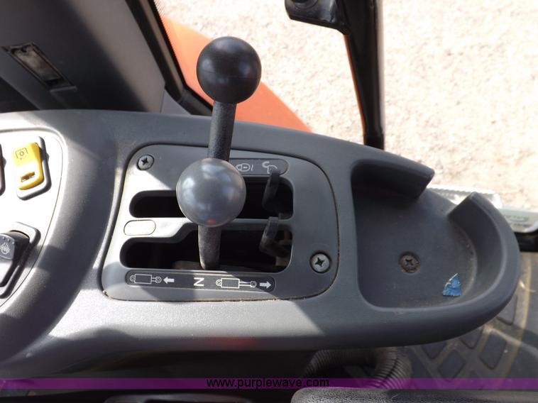 image for item H9112 1999 New Holland TV140 bi-directional MFWD tractor