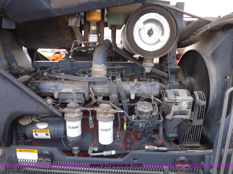 image for item H9112 1999 New Holland TV140 bi-directional MFWD tractor