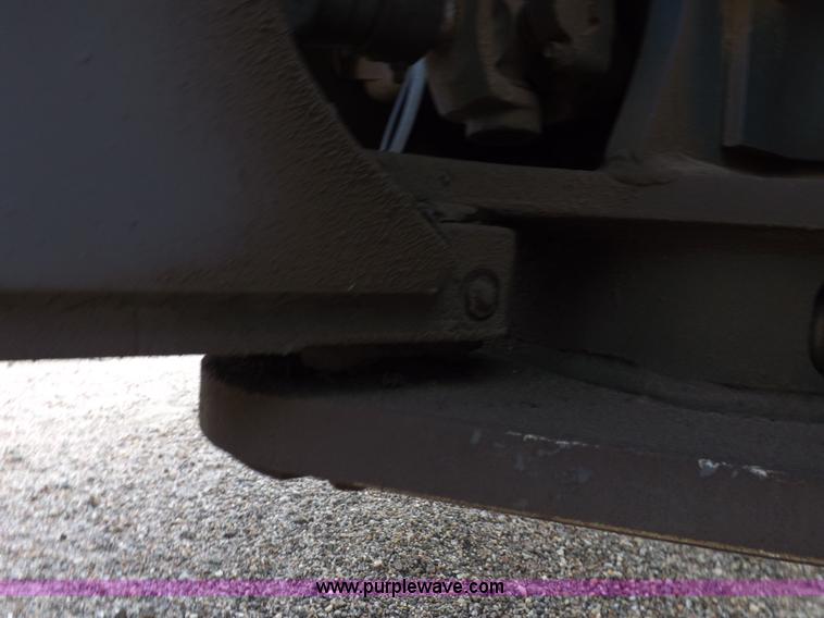 image for item H9112 1999 New Holland TV140 bi-directional MFWD tractor