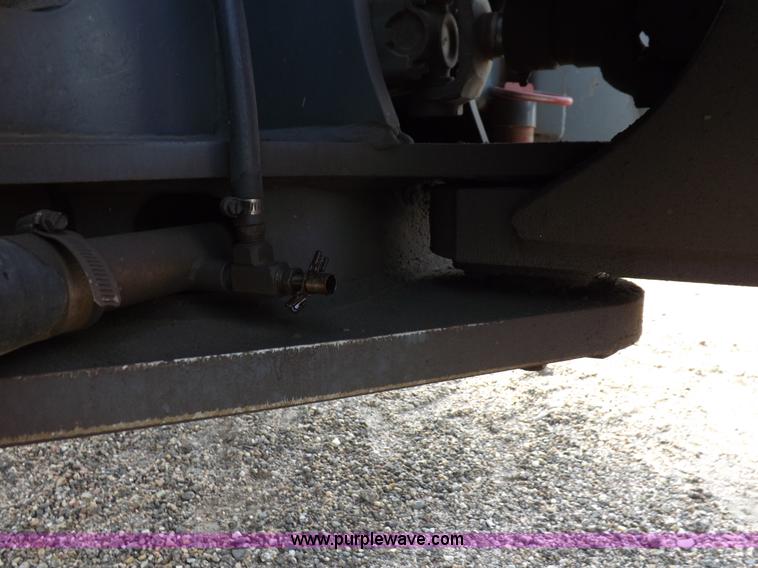 image for item H9112 1999 New Holland TV140 bi-directional MFWD tractor