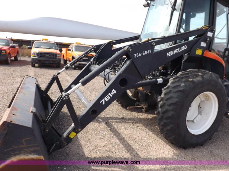 image for item H9112 1999 New Holland TV140 bi-directional MFWD tractor