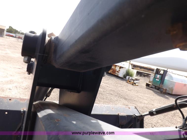 image for item H9112 1999 New Holland TV140 bi-directional MFWD tractor