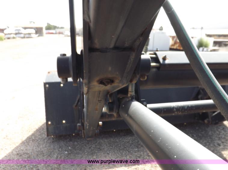 image for item H9112 1999 New Holland TV140 bi-directional MFWD tractor