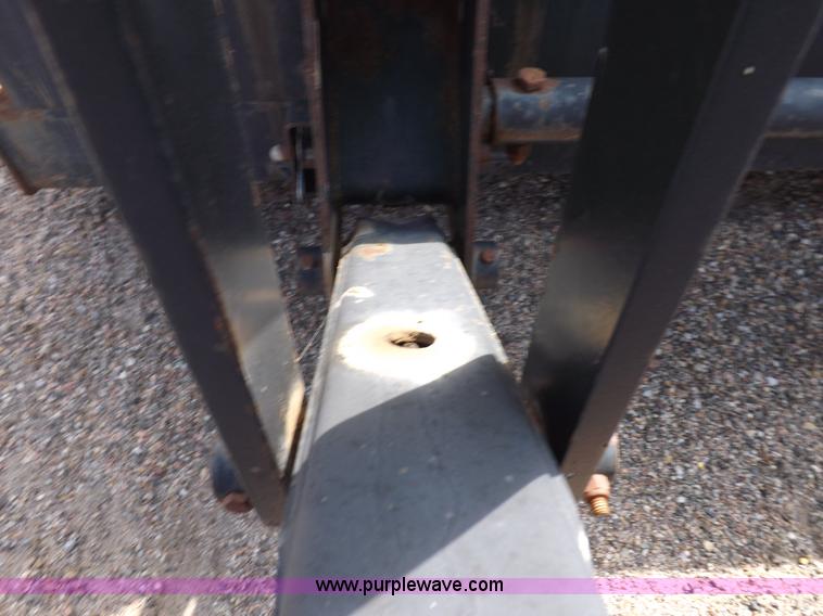 image for item H9112 1999 New Holland TV140 bi-directional MFWD tractor