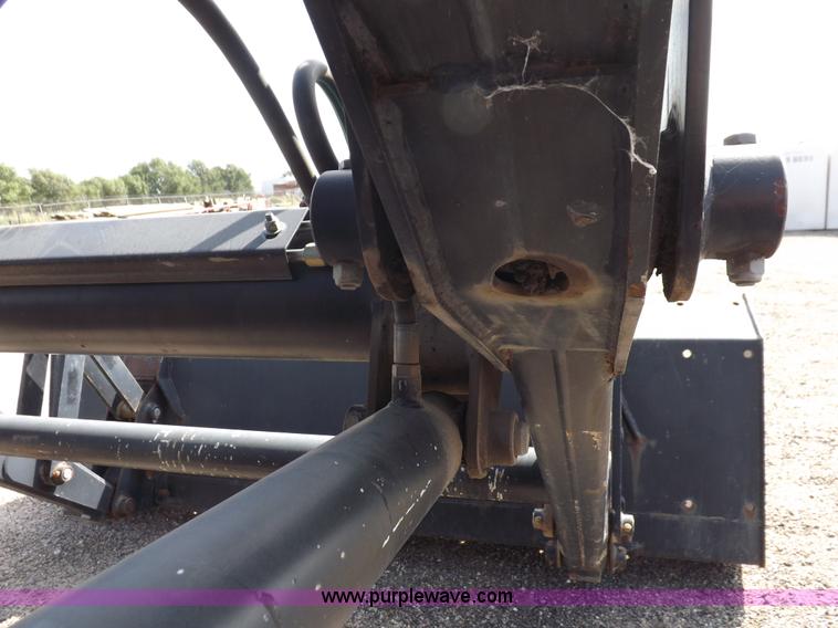 image for item H9112 1999 New Holland TV140 bi-directional MFWD tractor