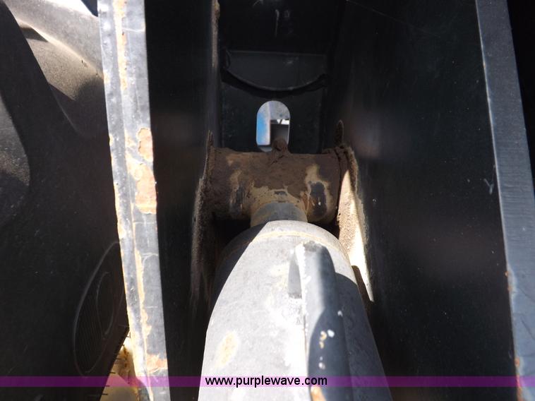 image for item H9112 1999 New Holland TV140 bi-directional MFWD tractor