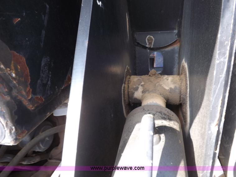 image for item H9112 1999 New Holland TV140 bi-directional MFWD tractor