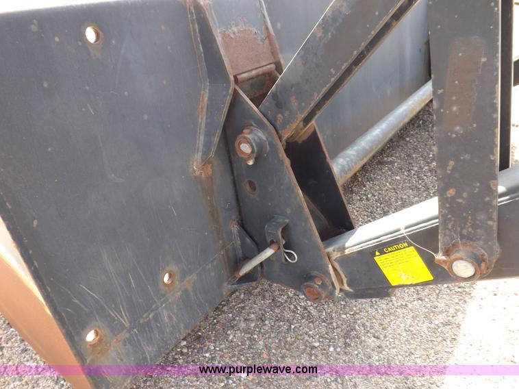 image for item H9112 1999 New Holland TV140 bi-directional MFWD tractor