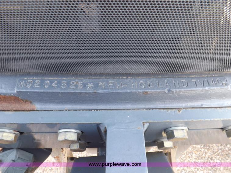 image for item H9112 1999 New Holland TV140 bi-directional MFWD tractor