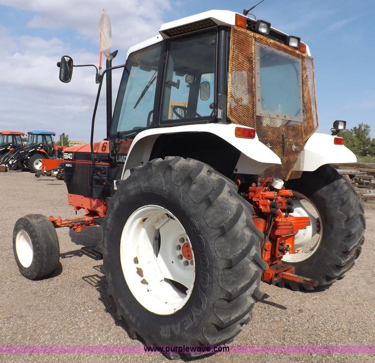 image for item H9113 1997 New Holland 6640SL tractor