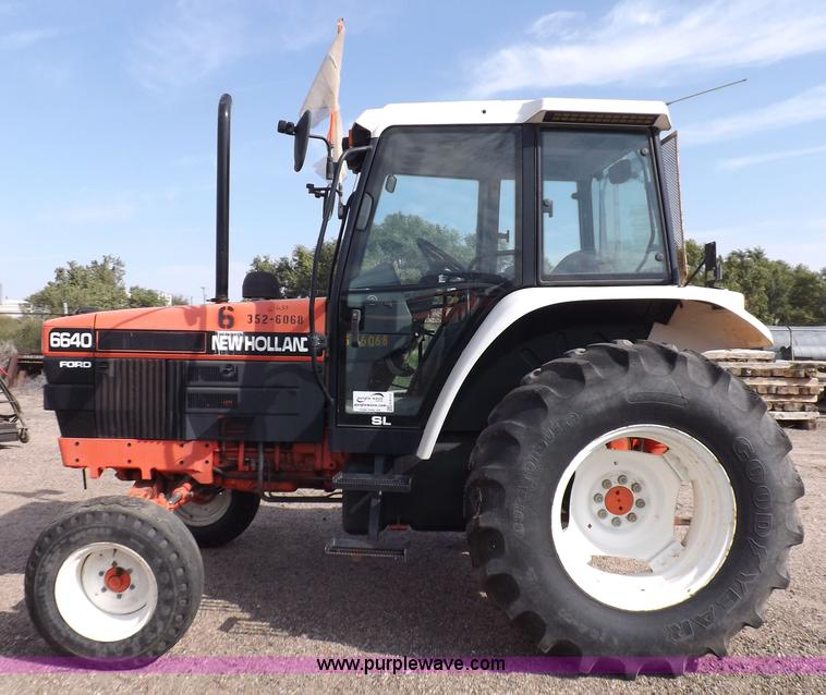 image for item H9113 1997 New Holland 6640SL tractor