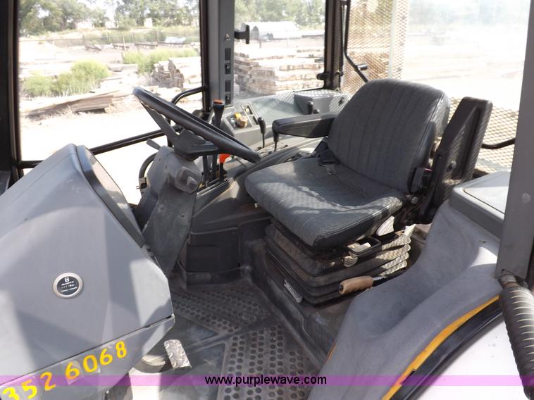 image for item H9113 1997 New Holland 6640SL tractor