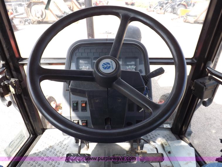 image for item H9113 1997 New Holland 6640SL tractor