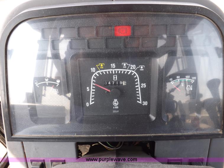 image for item H9113 1997 New Holland 6640SL tractor