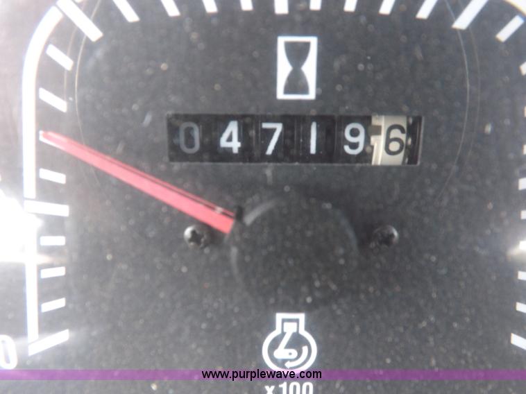 image for item H9113 1997 New Holland 6640SL tractor