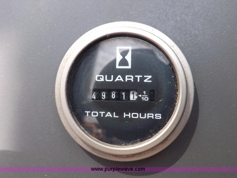 image for item H9113 1997 New Holland 6640SL tractor