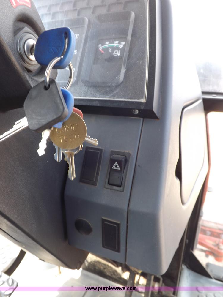 image for item H9113 1997 New Holland 6640SL tractor