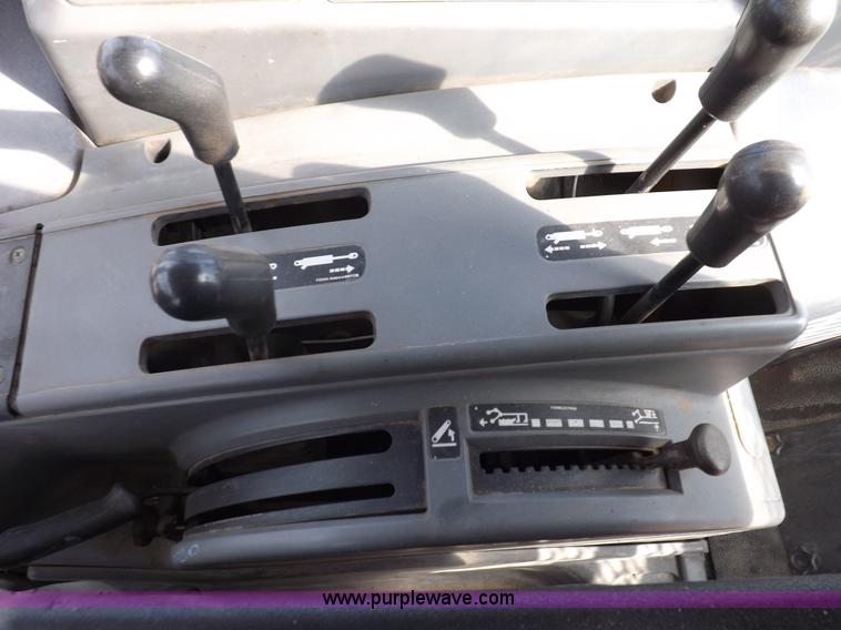 image for item H9113 1997 New Holland 6640SL tractor