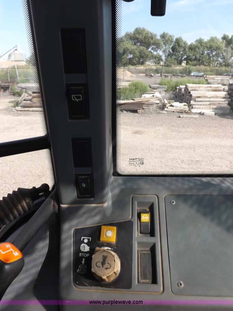 image for item H9113 1997 New Holland 6640SL tractor