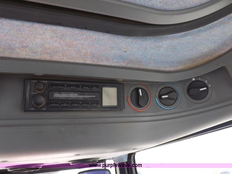 image for item H9113 1997 New Holland 6640SL tractor