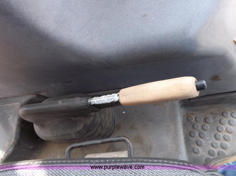 image for item H9113 1997 New Holland 6640SL tractor