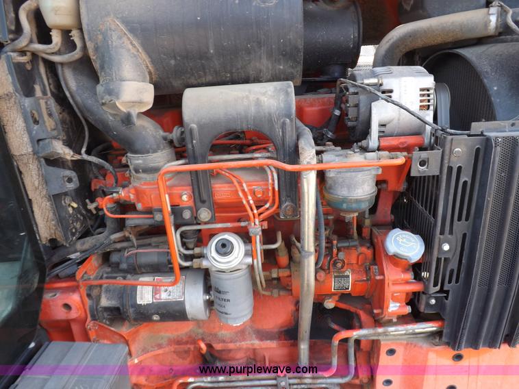 image for item H9113 1997 New Holland 6640SL tractor