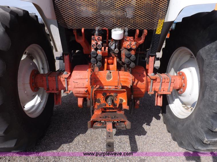 image for item H9113 1997 New Holland 6640SL tractor