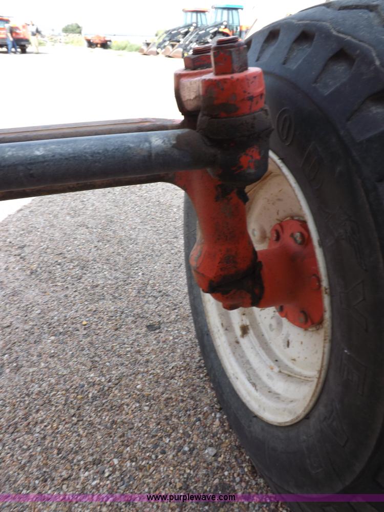 image for item H9113 1997 New Holland 6640SL tractor