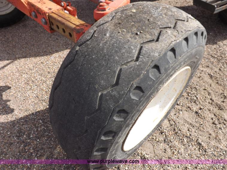 image for item H9113 1997 New Holland 6640SL tractor