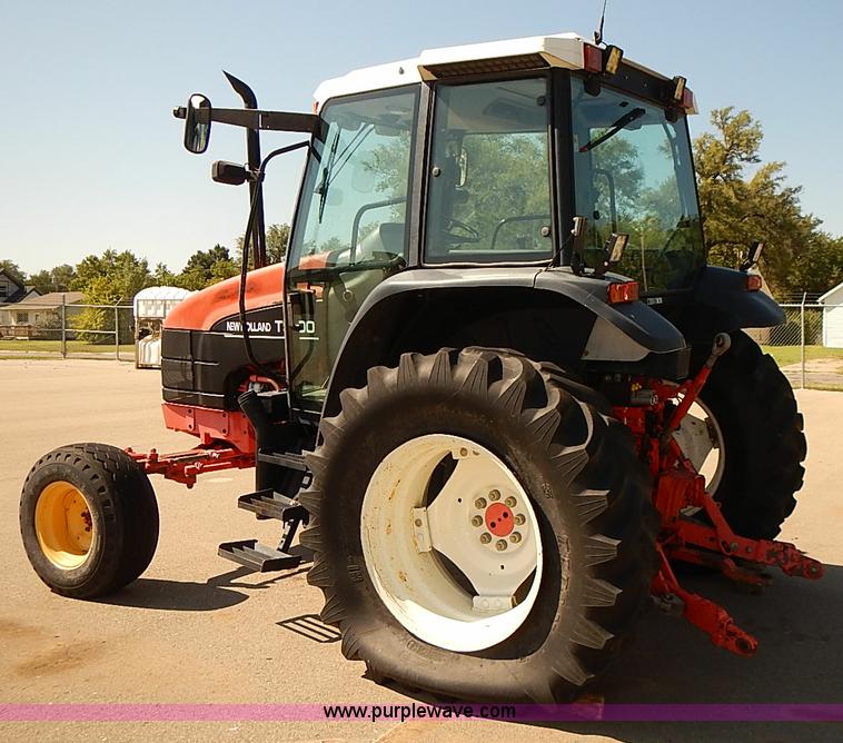 image for item J3022 2000 New Holland TS100 tractor